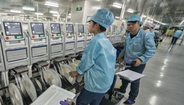 西媒：智能手機引領"中國創(chuàng)造" 改變"外來妹"生活